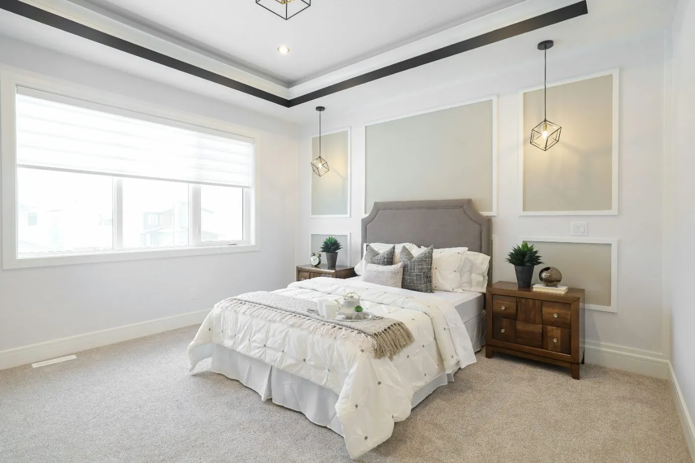 Plush neutral carpet in an open living and dining room with a fireplace